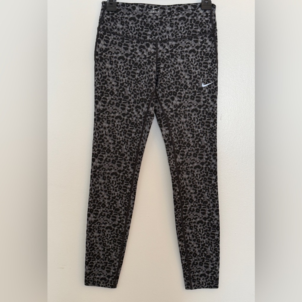 Nike Epic Run Dri-FIT performance tights in a black and grey leopard print.